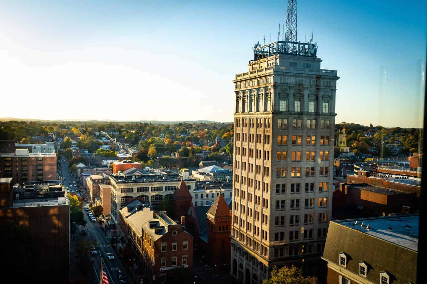 A panoramic view of a city from the top of a tall building, ideal for 55+ senior living in continuing care communities.