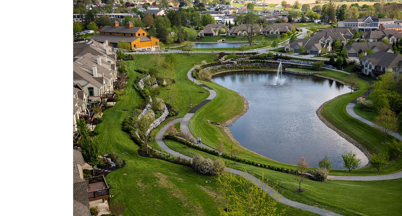 Aerial view of Willow Valley Communities campus offering upscale 55+ senior living with scenic amenities.